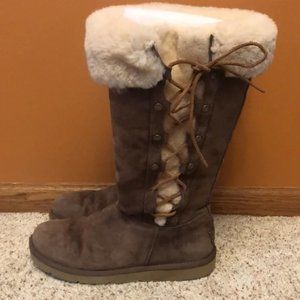 Authentic UGG tall boots. Size 7. Side lace. Brown.  metal tag